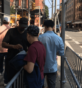 Getting a hand stamp for the Supreme New York store